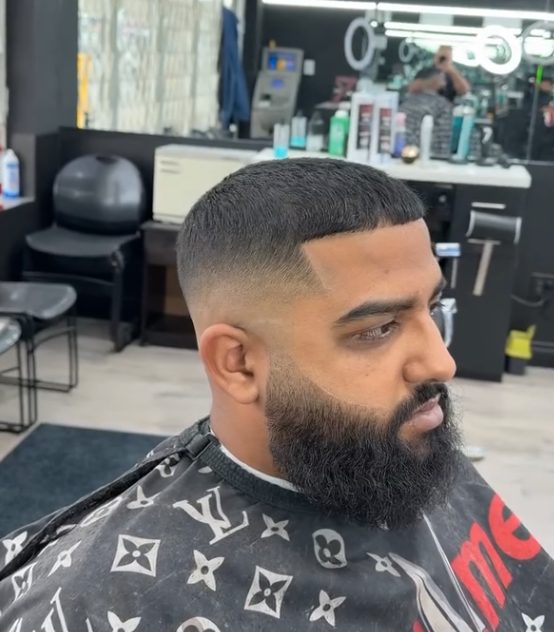 Skin fade and full beard