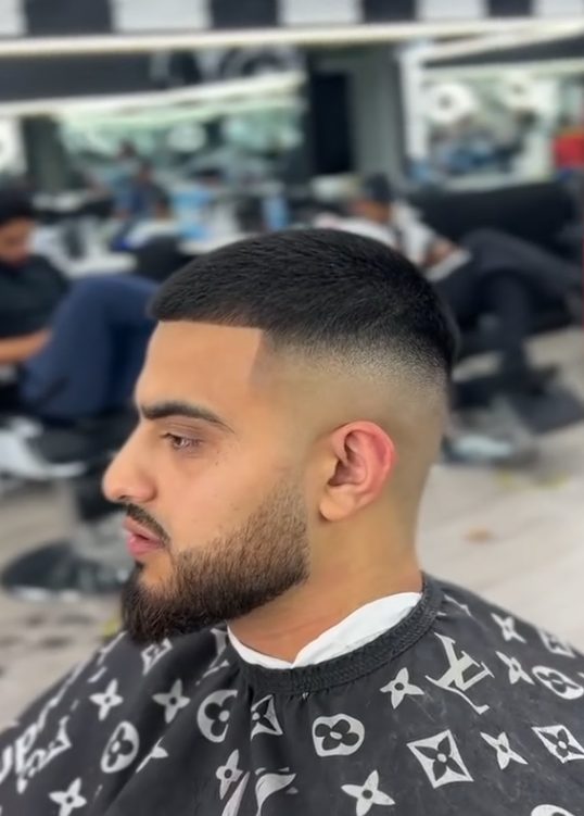 Skin fade and beard line-up
